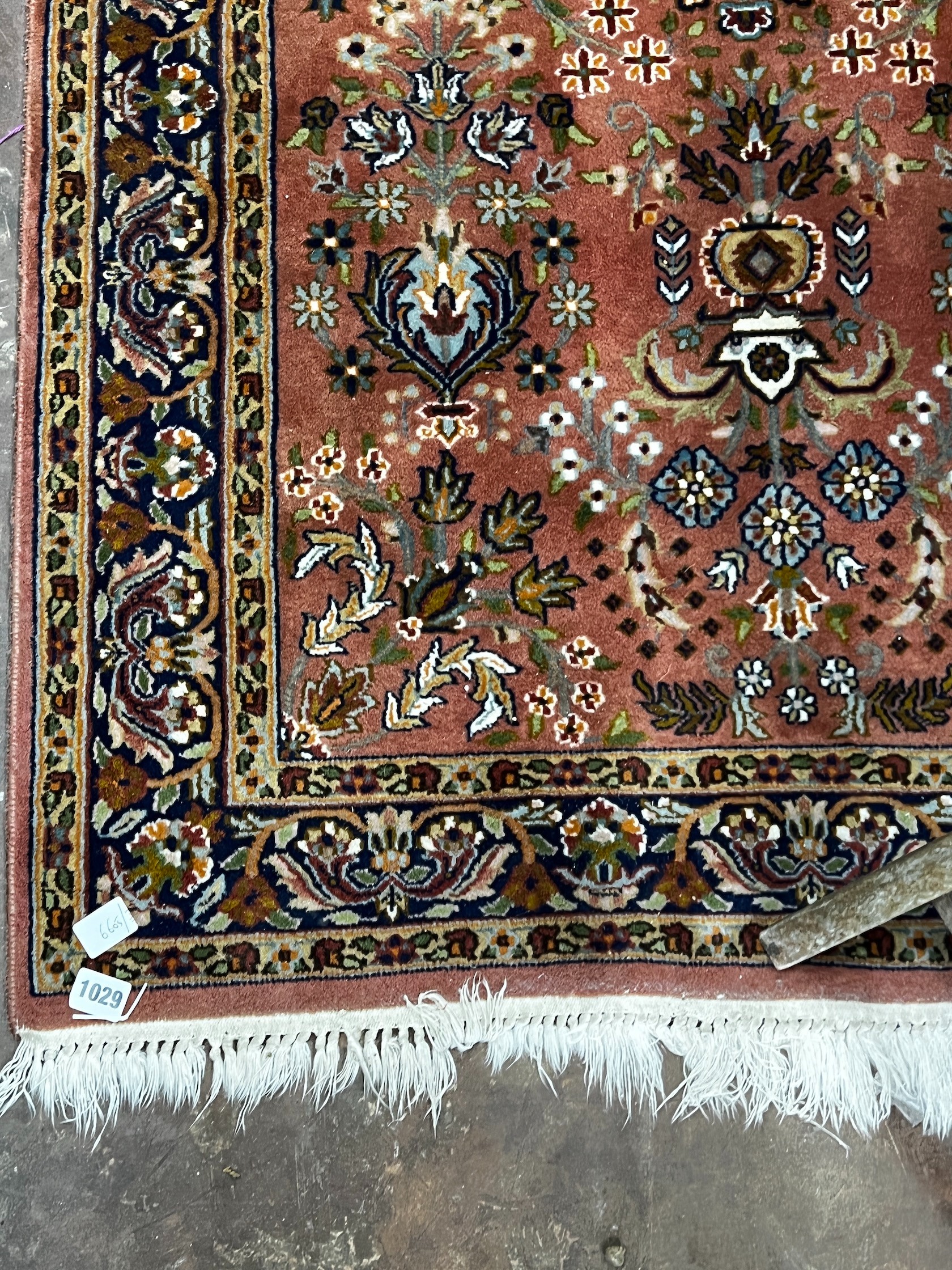 A North West Persian peach ground rug, 160 x 93cm